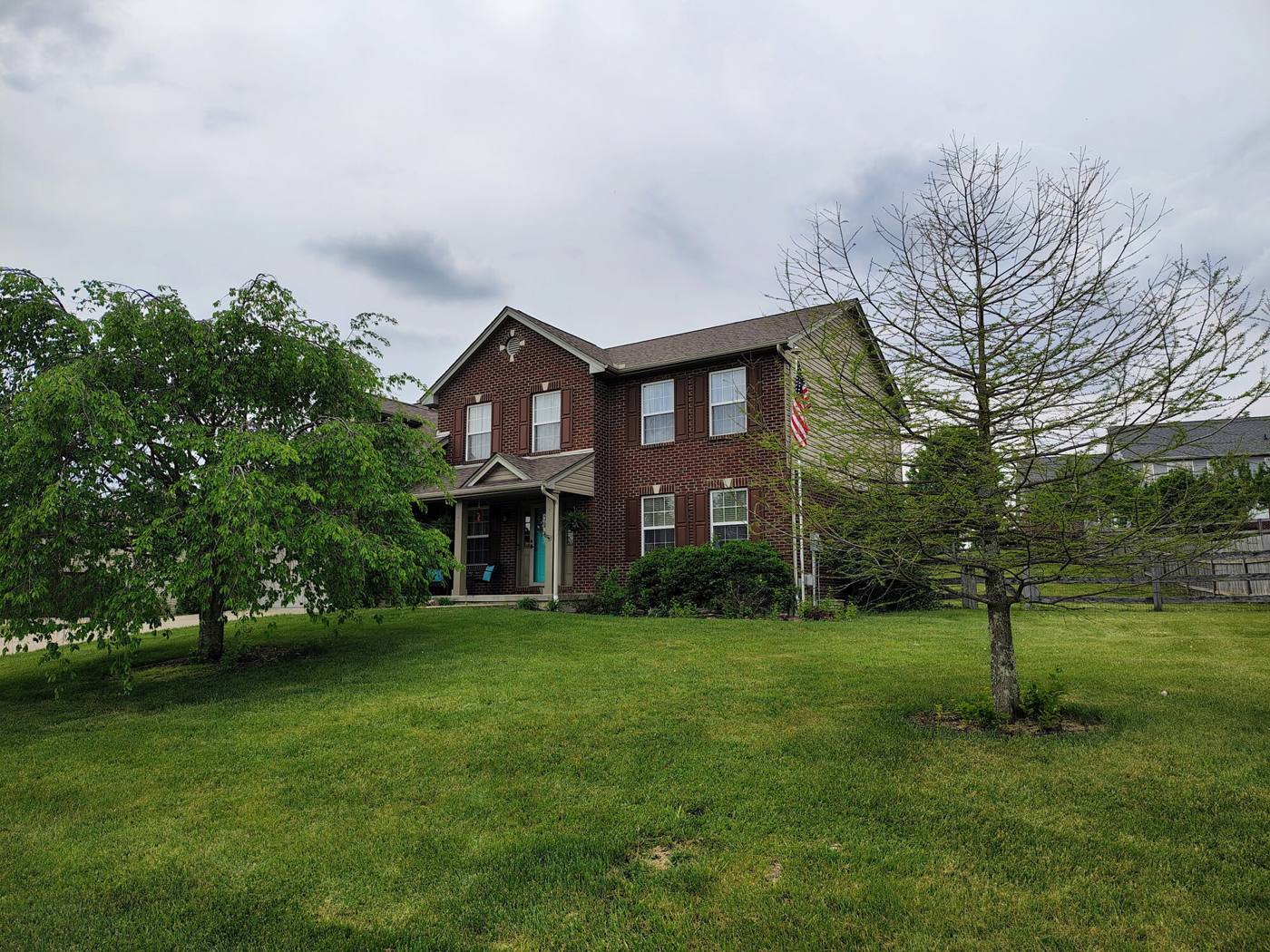 Brick two-story Cincinnati home with newly installed architectural shingle roof