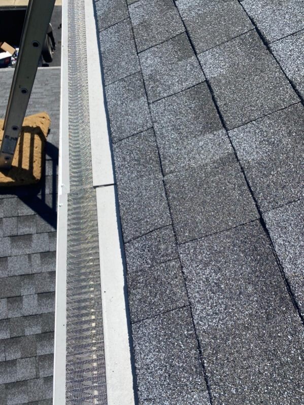 Close-up of leaf-guard gutter protection installed by Gutter Buddy